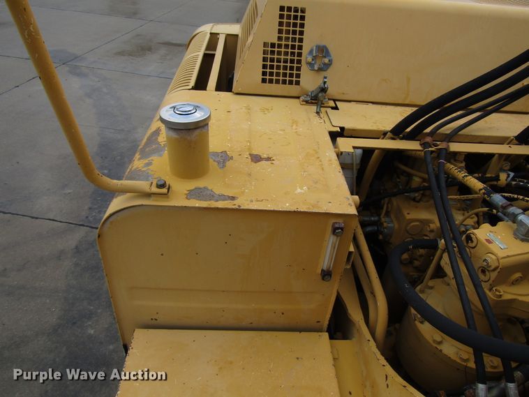 image for item DG6641 1994 John Deere 595D rubber tire excavator