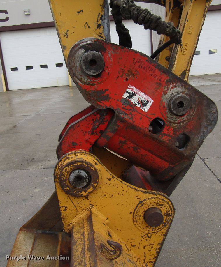 image for item DG6641 1994 John Deere 595D rubber tire excavator