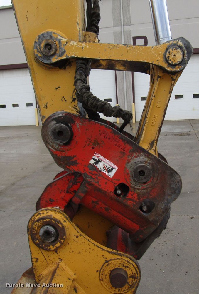 image for item DG6641 1994 John Deere 595D rubber tire excavator