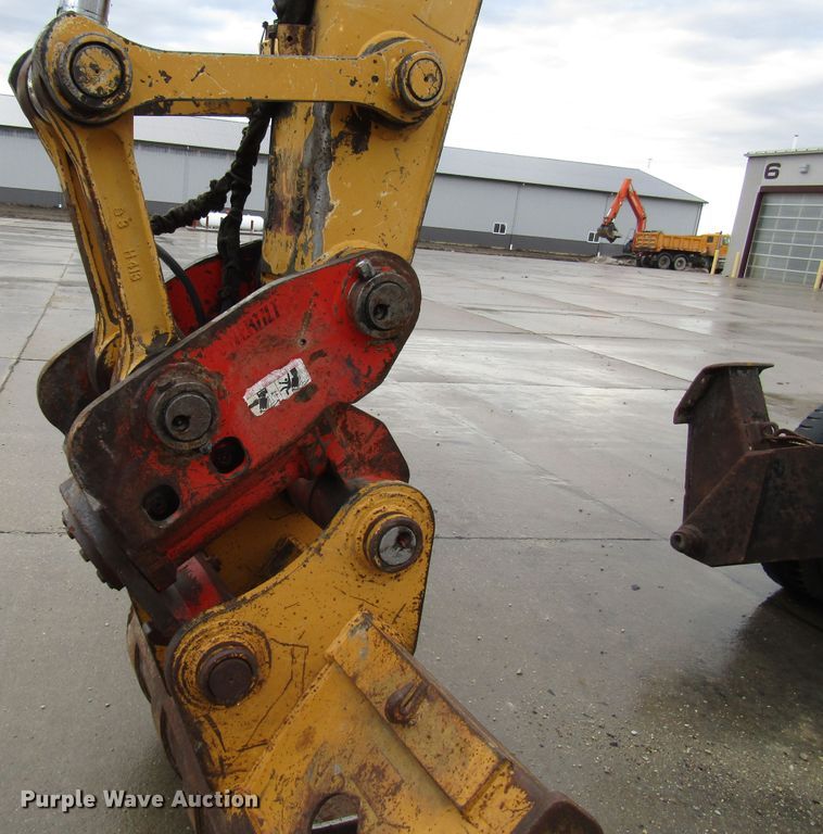 image for item DG6641 1994 John Deere 595D rubber tire excavator