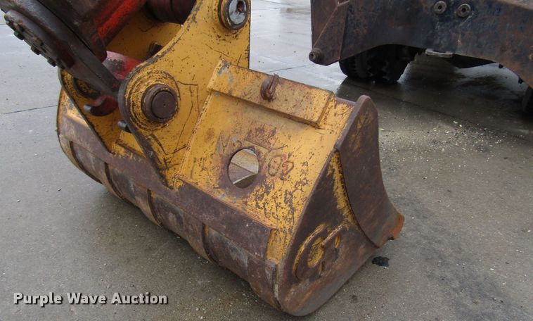 image for item DG6641 1994 John Deere 595D rubber tire excavator