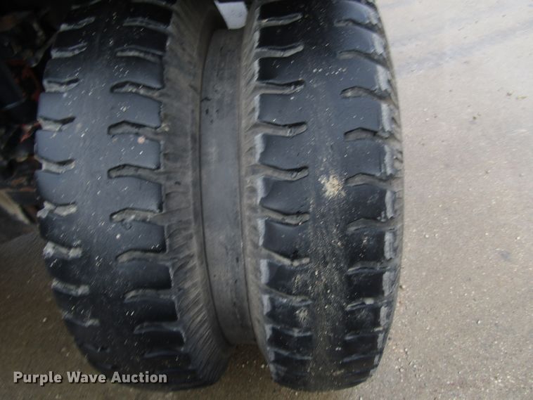 image for item DG6641 1994 John Deere 595D rubber tire excavator
