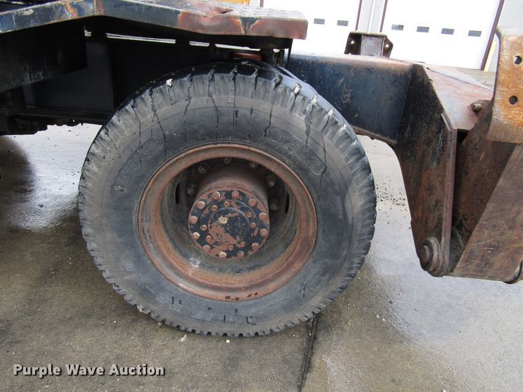 image for item DG6641 1994 John Deere 595D rubber tire excavator