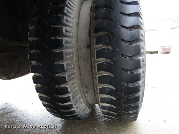 image for item DG6641 1994 John Deere 595D rubber tire excavator
