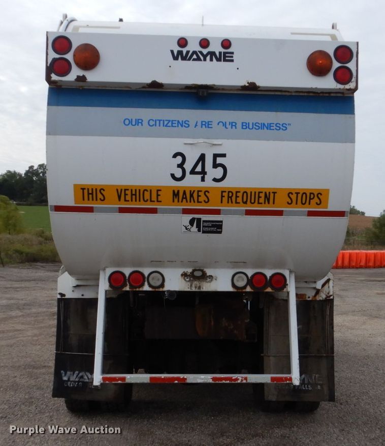 image for item EC9005 2001 Freightliner FL80 refuse truck