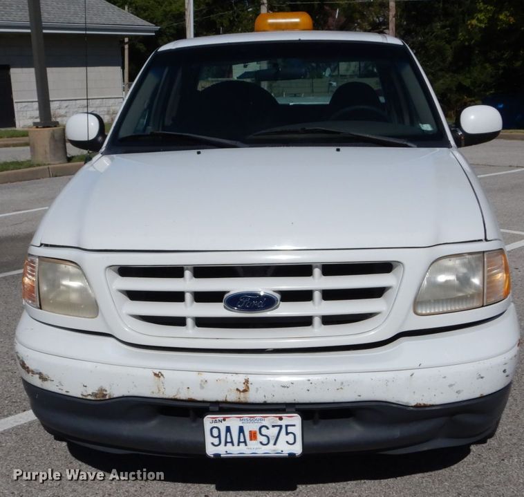 image for item DH2113 1999 Ford F150 SuperCab pickup truck