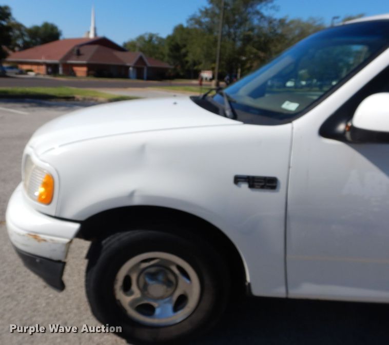 image for item DH2113 1999 Ford F150 SuperCab pickup truck