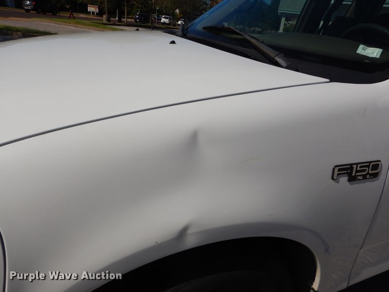 image for item DH2113 1999 Ford F150 SuperCab pickup truck