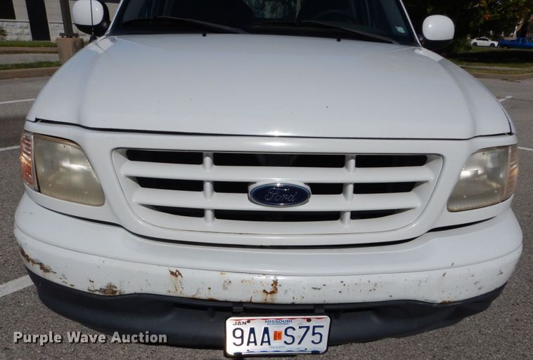 image for item DH2113 1999 Ford F150 SuperCab pickup truck