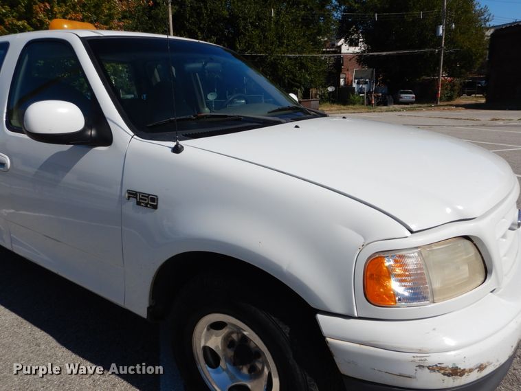 image for item DH2113 1999 Ford F150 SuperCab pickup truck