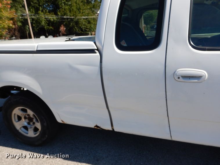 image for item DH2113 1999 Ford F150 SuperCab pickup truck