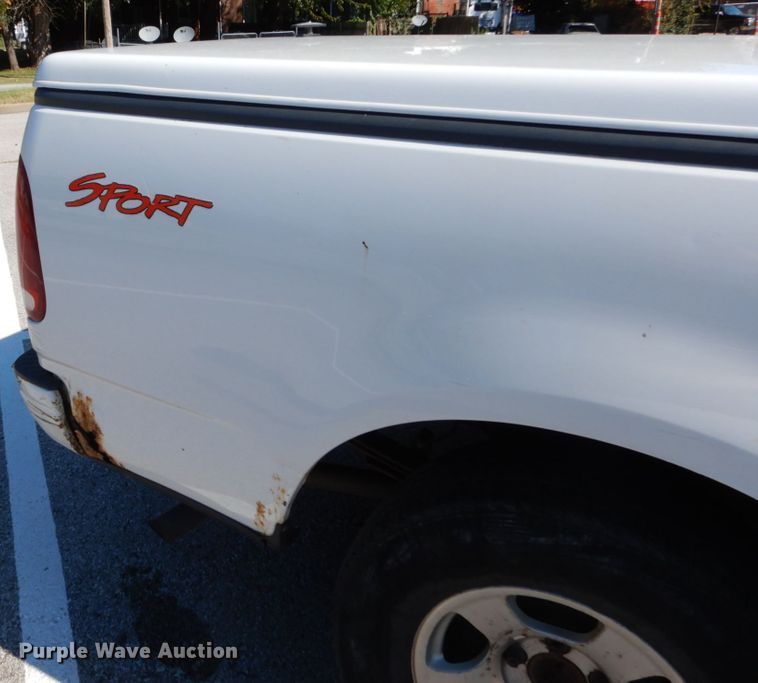 image for item DH2113 1999 Ford F150 SuperCab pickup truck