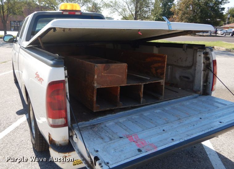 image for item DH2113 1999 Ford F150 SuperCab pickup truck