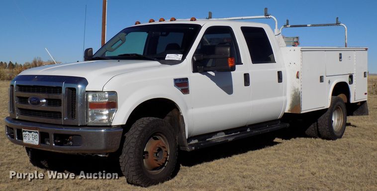 image for item DD6048 2009 Ford F350 Super Duty Crew Cab utility bed pickup truck