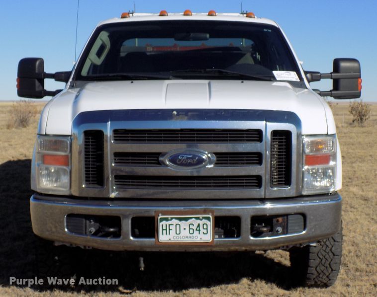 image for item DD6048 2009 Ford F350 Super Duty Crew Cab utility bed pickup truck