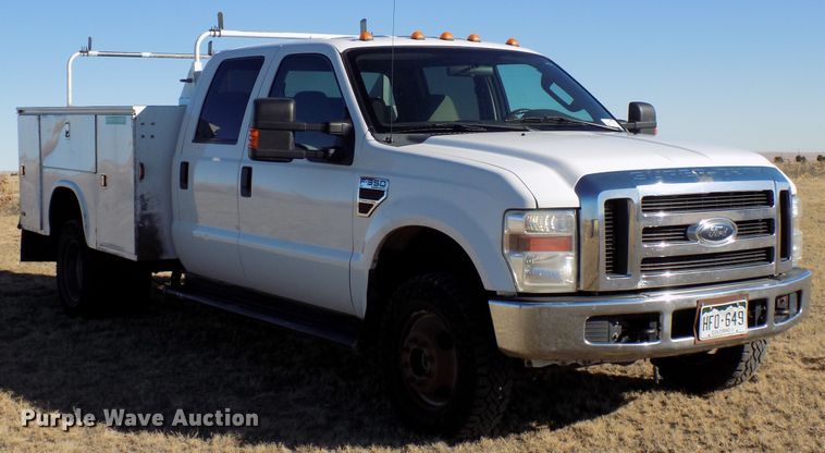 image for item DD6048 2009 Ford F350 Super Duty Crew Cab utility bed pickup truck