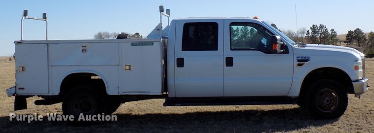 image for item DD6048 2009 Ford F350 Super Duty Crew Cab utility bed pickup truck