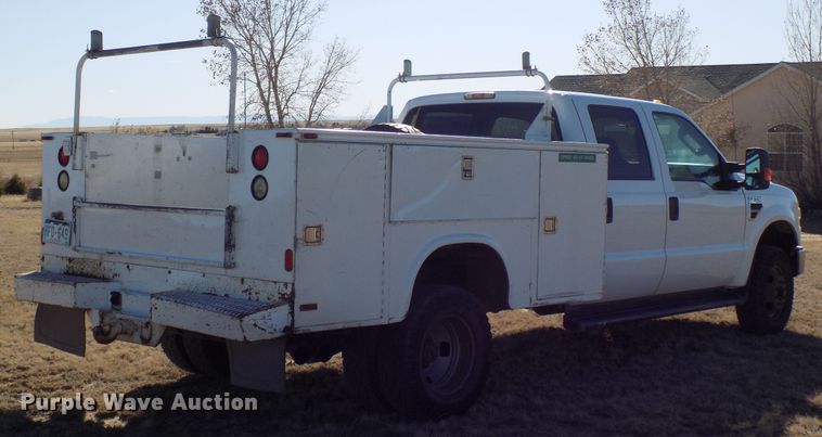 image for item DD6048 2009 Ford F350 Super Duty Crew Cab utility bed pickup truck
