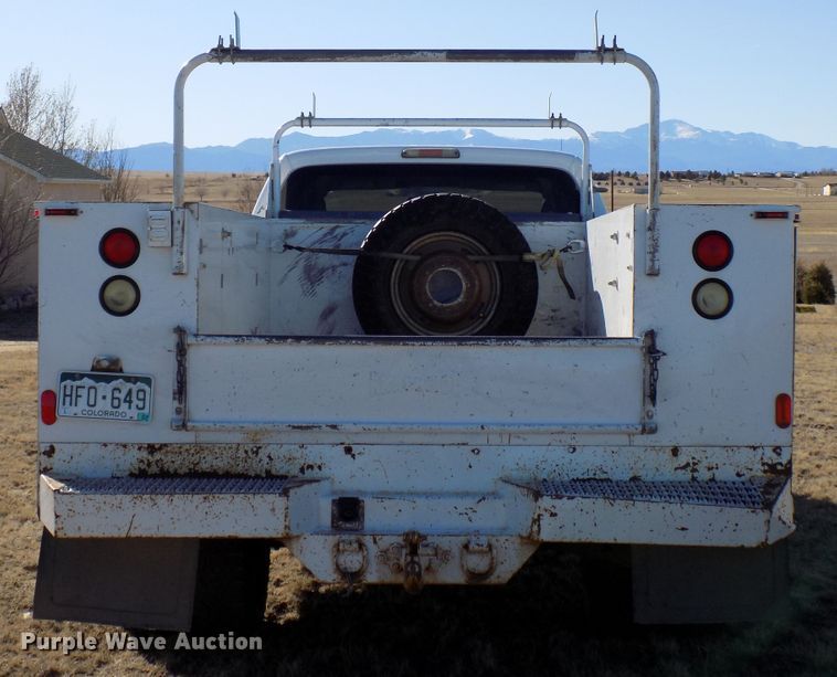 image for item DD6048 2009 Ford F350 Super Duty Crew Cab utility bed pickup truck