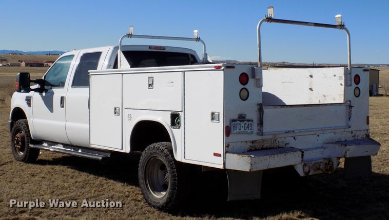image for item DD6048 2009 Ford F350 Super Duty Crew Cab utility bed pickup truck