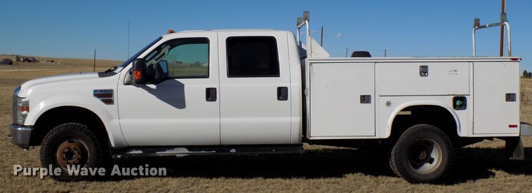 image for item DD6048 2009 Ford F350 Super Duty Crew Cab utility bed pickup truck