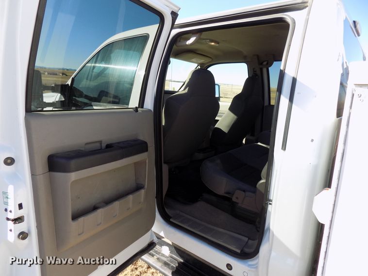 image for item DD6048 2009 Ford F350 Super Duty Crew Cab utility bed pickup truck