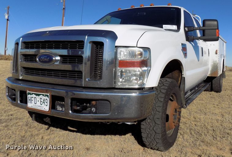 image for item DD6048 2009 Ford F350 Super Duty Crew Cab utility bed pickup truck