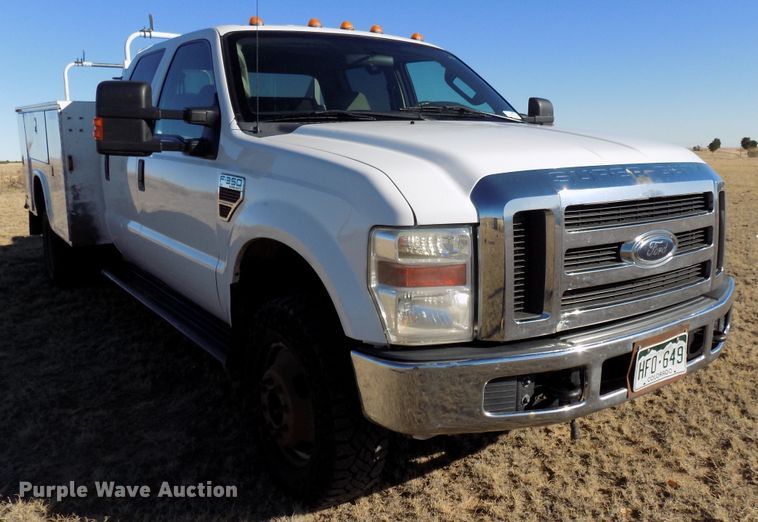 image for item DD6048 2009 Ford F350 Super Duty Crew Cab utility bed pickup truck