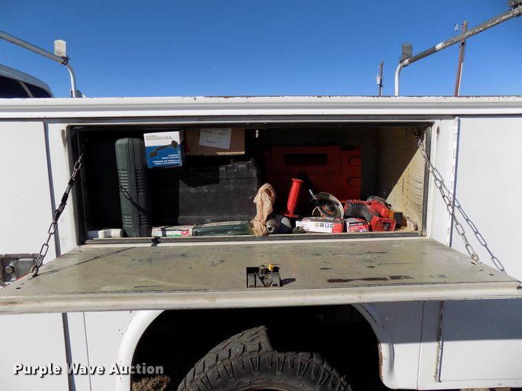 image for item DD6048 2009 Ford F350 Super Duty Crew Cab utility bed pickup truck