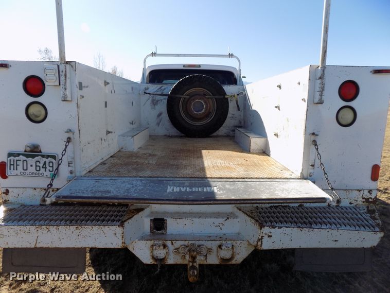 image for item DD6048 2009 Ford F350 Super Duty Crew Cab utility bed pickup truck