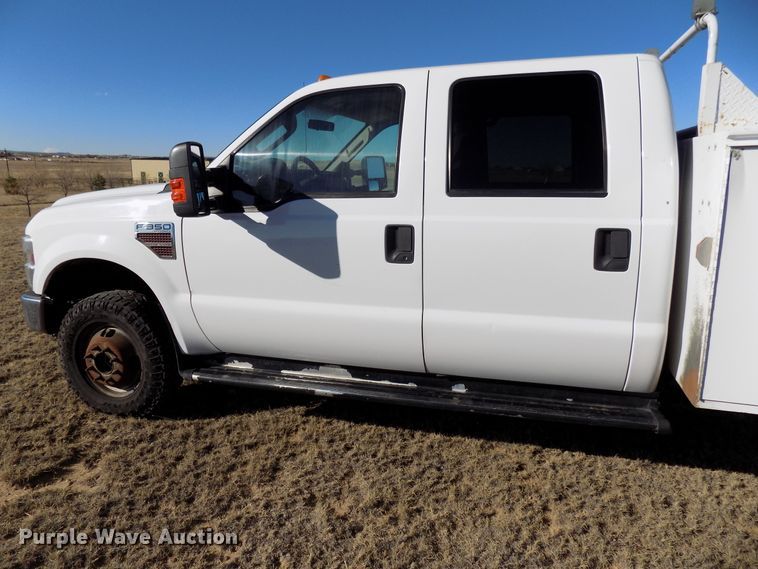 image for item DD6048 2009 Ford F350 Super Duty Crew Cab utility bed pickup truck