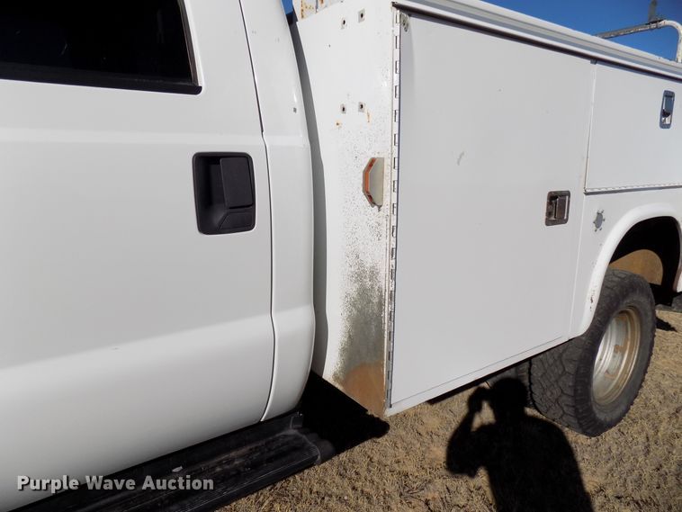 image for item DD6048 2009 Ford F350 Super Duty Crew Cab utility bed pickup truck