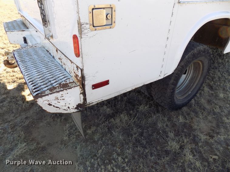 image for item DD6048 2009 Ford F350 Super Duty Crew Cab utility bed pickup truck