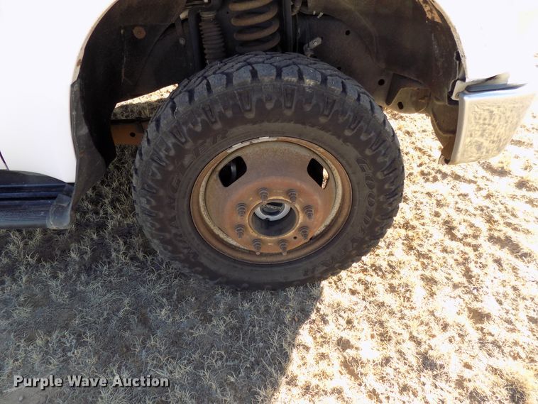 image for item DD6048 2009 Ford F350 Super Duty Crew Cab utility bed pickup truck