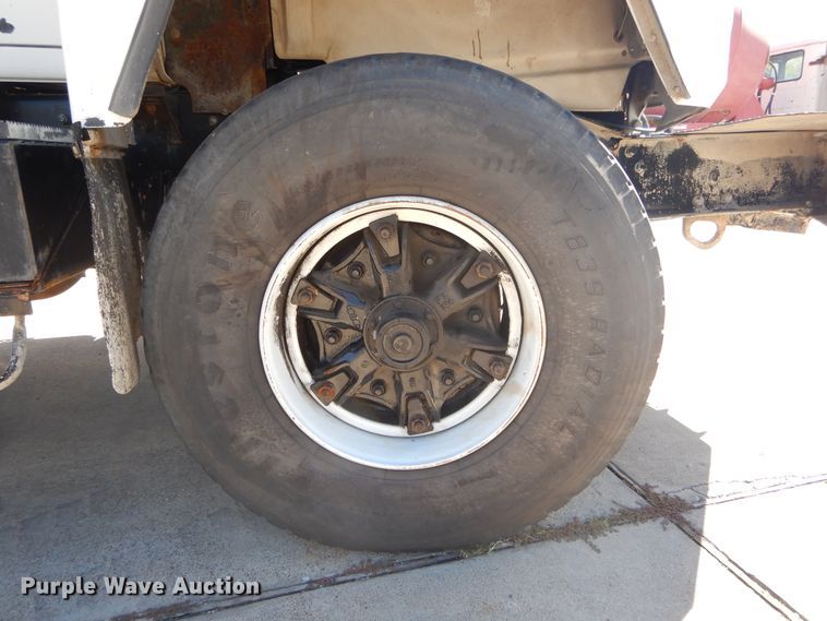 image for item DI1776 2000 Mack DM690S ready mix truck