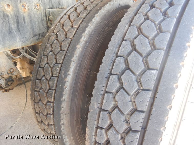 image for item DI1776 2000 Mack DM690S ready mix truck