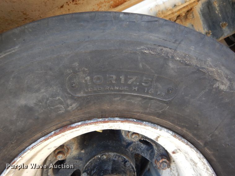 image for item DI1776 2000 Mack DM690S ready mix truck