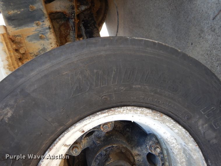 image for item DI1776 2000 Mack DM690S ready mix truck