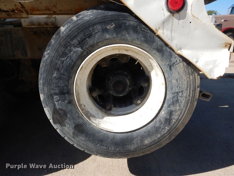 image for item DI1776 2000 Mack DM690S ready mix truck