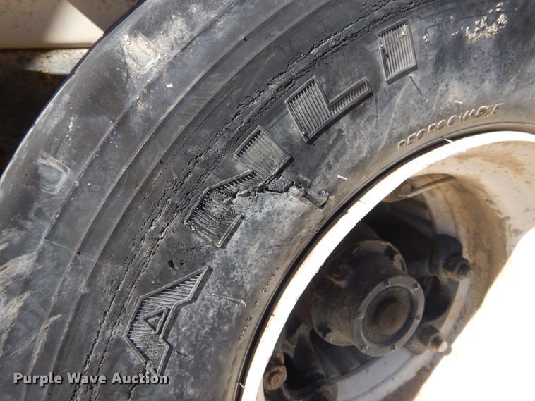 image for item DI1776 2000 Mack DM690S ready mix truck