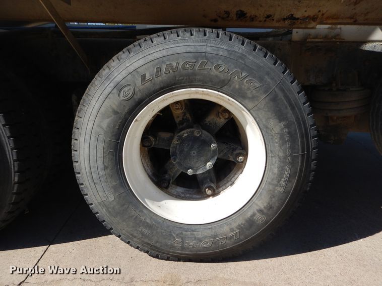 image for item DI1776 2000 Mack DM690S ready mix truck