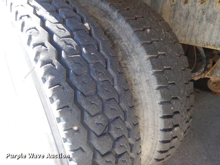 image for item DI1776 2000 Mack DM690S ready mix truck