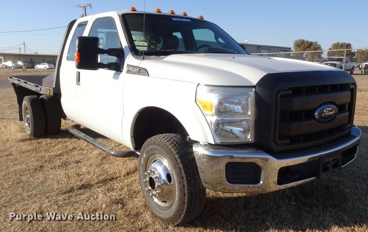 image for item GC9080 2015 Ford F350 Super Duty SuperCab flatbed pickup truck
