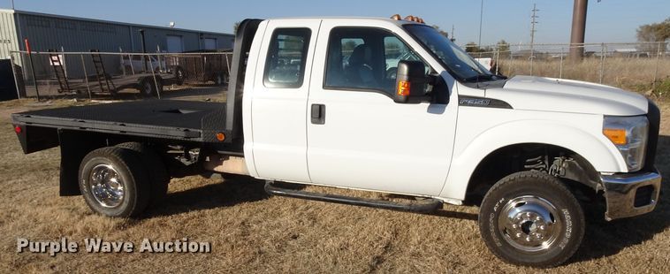 image for item GC9080 2015 Ford F350 Super Duty SuperCab flatbed pickup truck