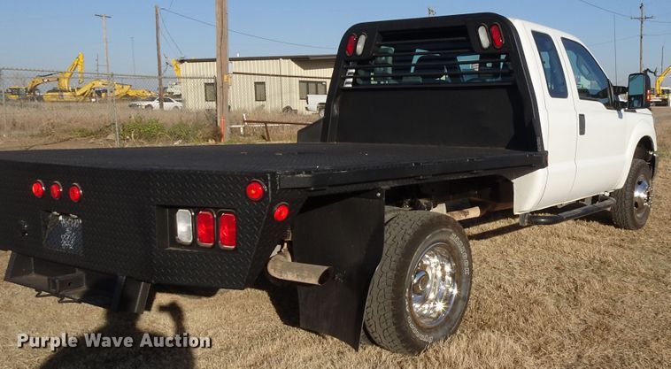 image for item GC9080 2015 Ford F350 Super Duty SuperCab flatbed pickup truck