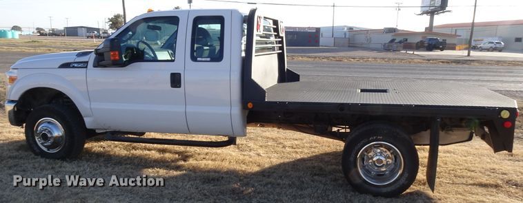 image for item GC9080 2015 Ford F350 Super Duty SuperCab flatbed pickup truck
