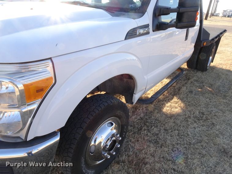 image for item GC9080 2015 Ford F350 Super Duty SuperCab flatbed pickup truck