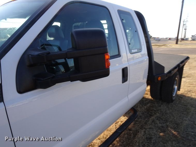 image for item GC9080 2015 Ford F350 Super Duty SuperCab flatbed pickup truck