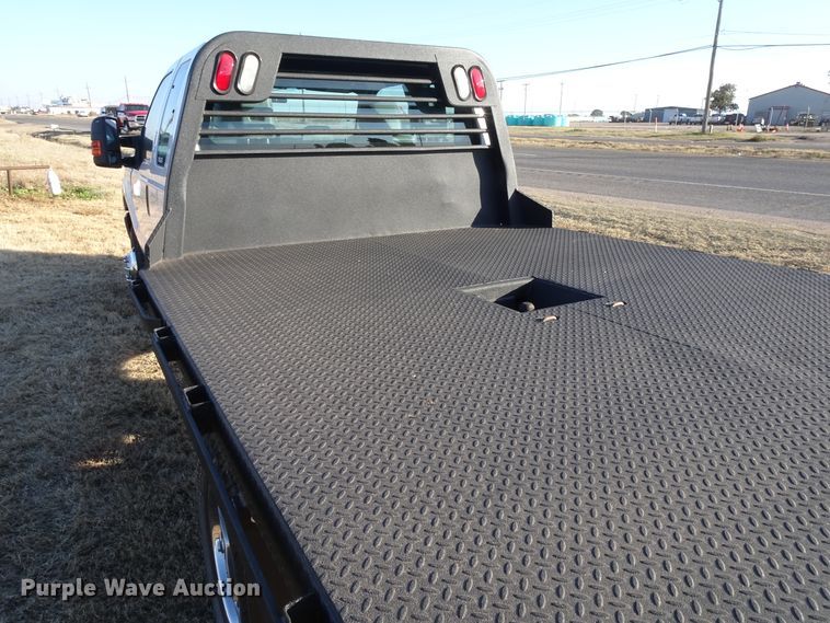 image for item GC9080 2015 Ford F350 Super Duty SuperCab flatbed pickup truck