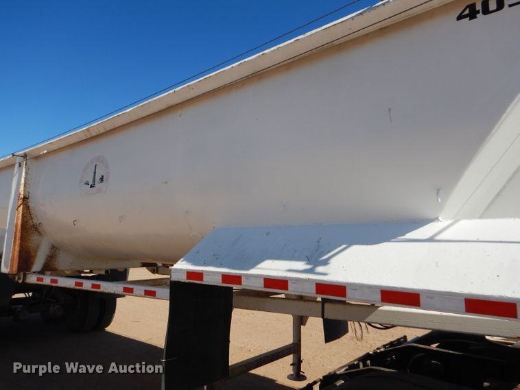 image for item DG0287 1999 Western Construction STR32 end dump trailer